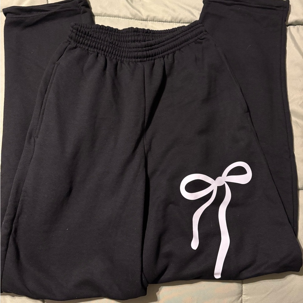 Women’s Black sweats with White Bow